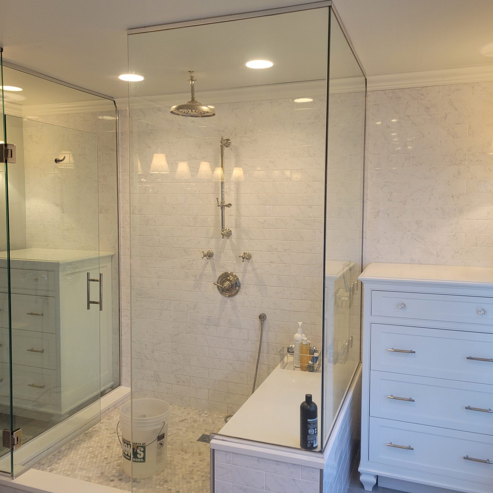 Marble walk-in shower by Keeler Carpentry