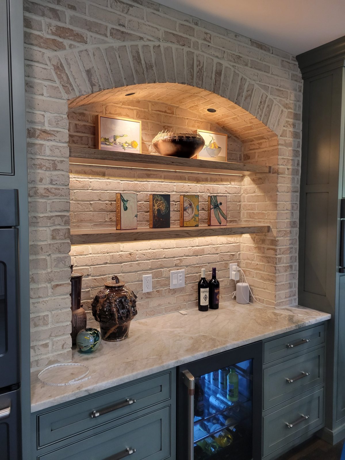 Brick wine alcove with shelving