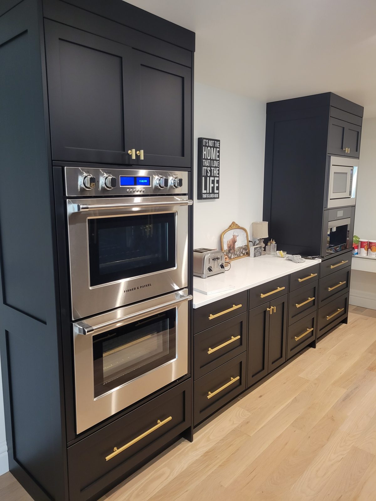 Modern dark kitchen with custom cabinetry